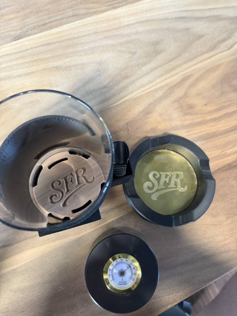Turned cigar ashtray and cup engraved SFR with hygrometer