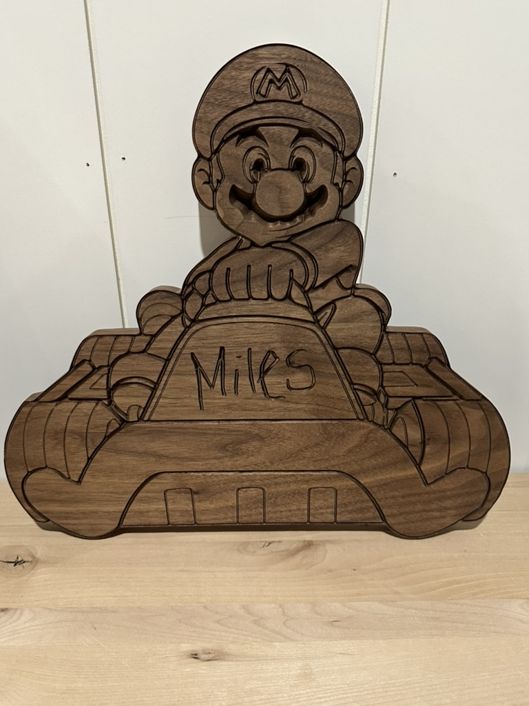 Carved walnut Mario Kart plaque with the name Miles