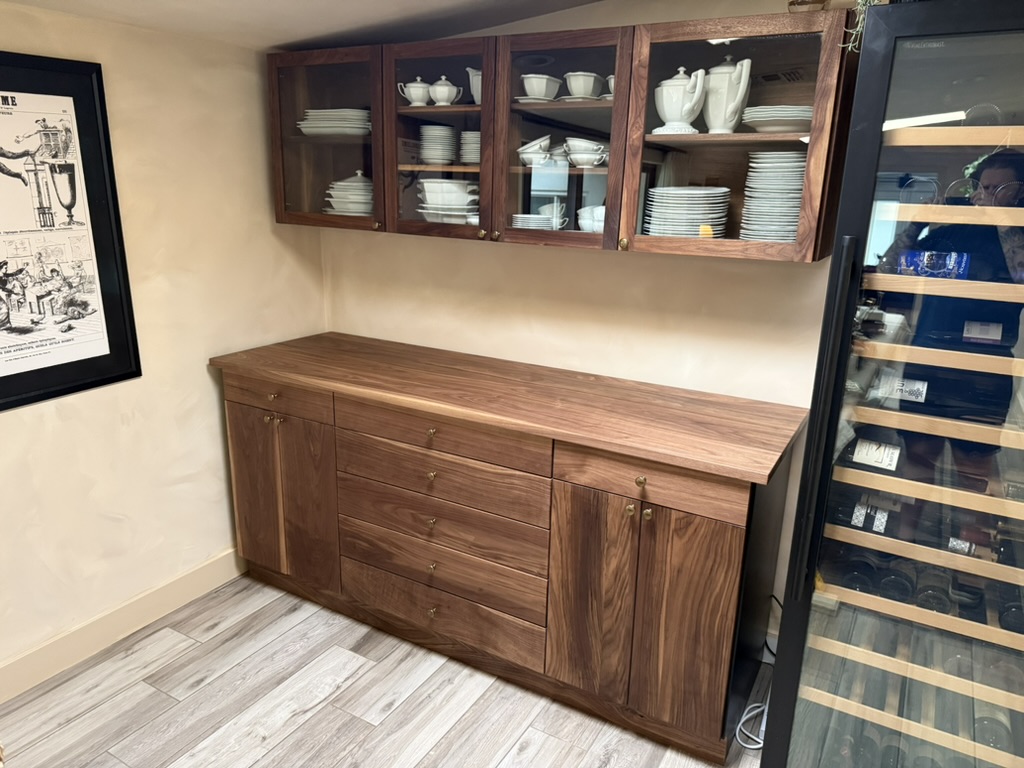 Walnut hutch with glass display cabinets and a sideboard